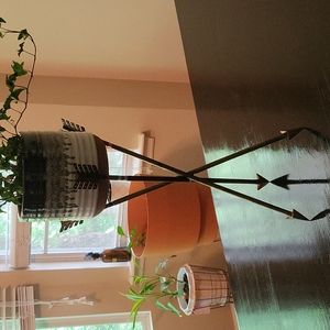 Handcrafted welded arrow plant stand